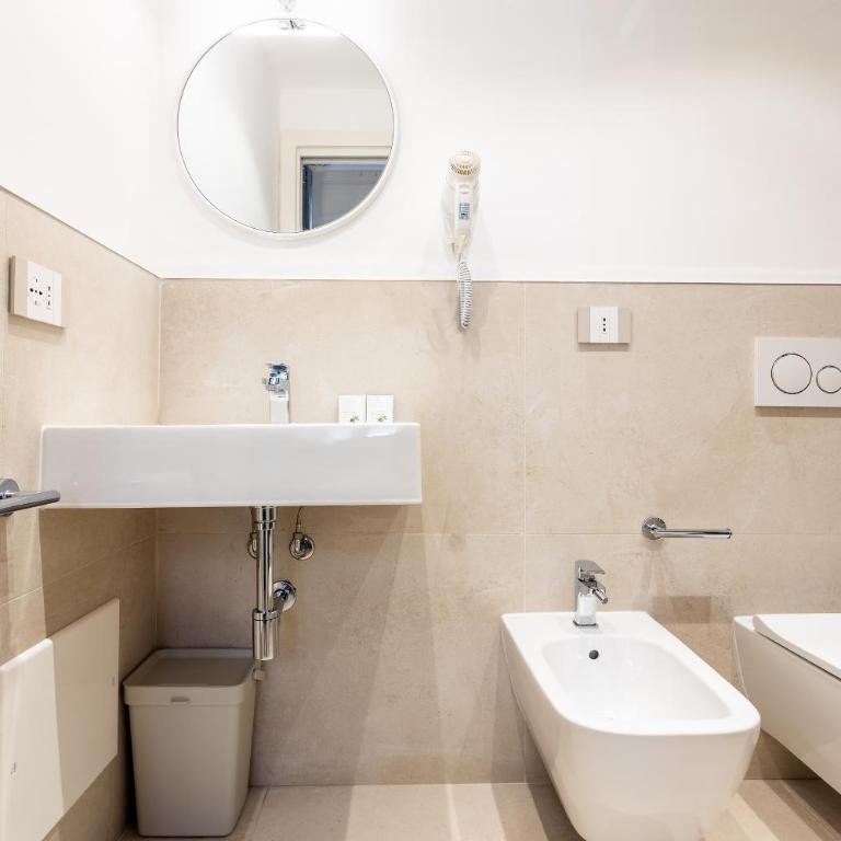 Magnini Rooms - Camera Quadrupla con Bagno Privato - 9
