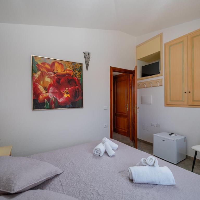 Rooms Tavolara - Camera Quadrupla con Balcone - 6