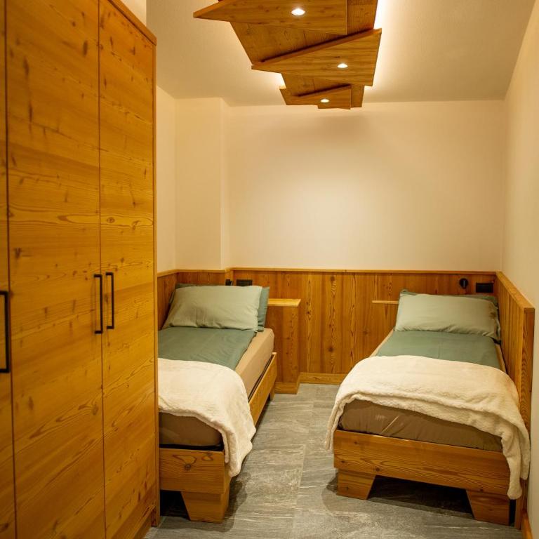 Dolomites Chalet Wolf - Deluxe-Apartment mit 2 Schlafzimmern und Gartenblick - 9