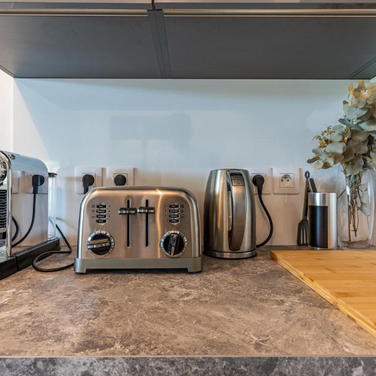 Appartement climatisé les pieds dans l'eau pour 6 personnes avec 1 suite parentale, 1 chambre double et 1 mini chambre Piscine sur le toit clim garage - Appartement 3 Chambres - 43
