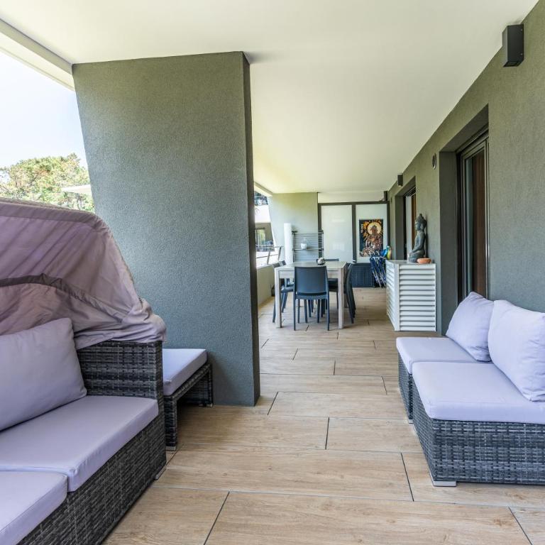Appartement climatisé les pieds dans l'eau pour 6 personnes avec 1 suite parentale, 1 chambre double et 1 mini chambre Piscine sur le toit clim garage - Appartement 3 Chambres - 62