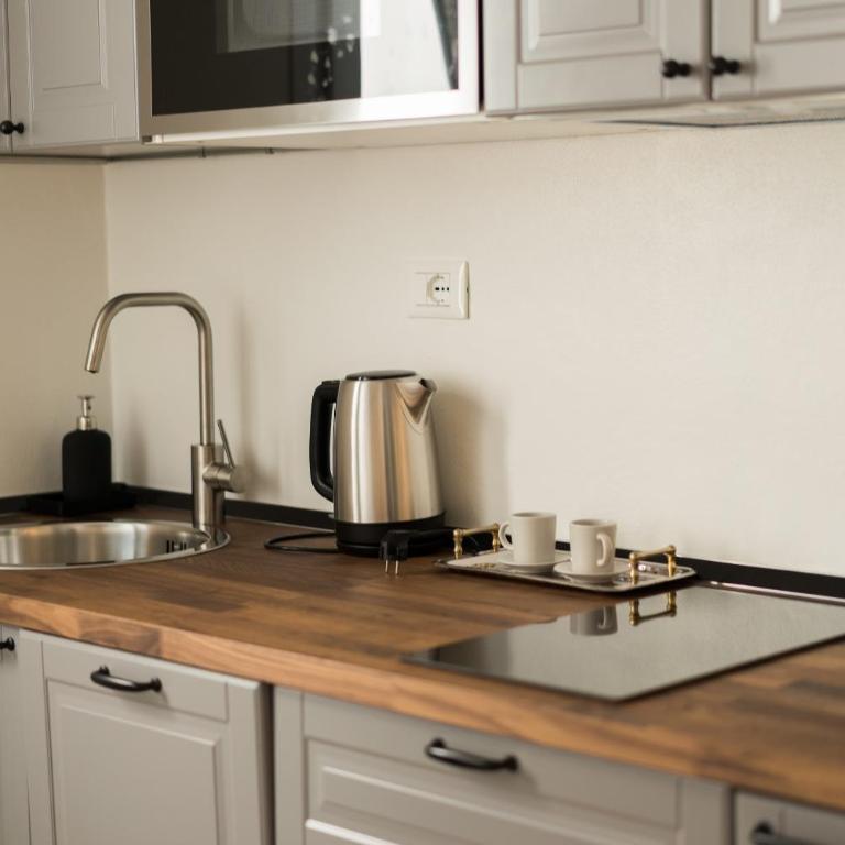 Arena Rooms - Three-Bedroom Apartment - 2