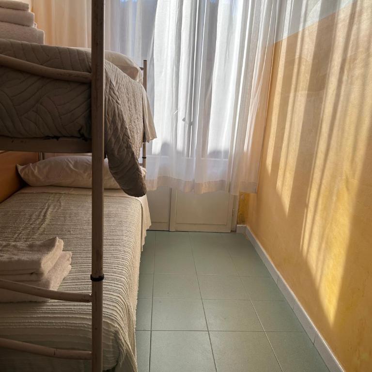 Hotel Montebello-Iconic Brunch 11-13, Apericena 19-21, Opera, Samsara e Beach Village -Young ALL Inclusive - over 16 - Economy Twin Room with bunk bed - 2
