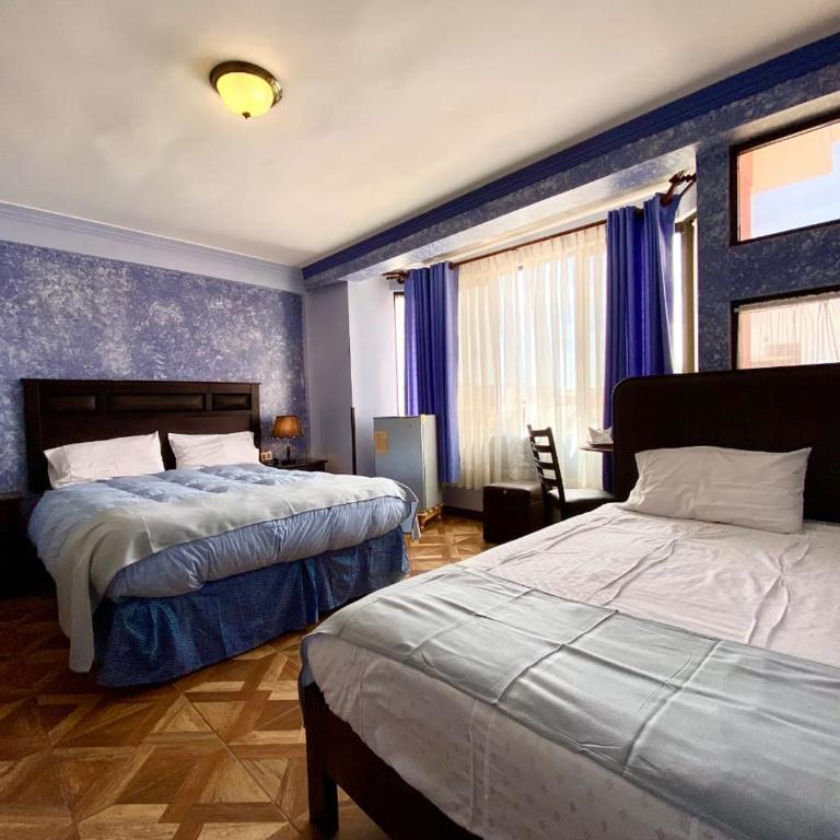 Las Tholas Hotel - Habitación Familiar con baño compartido - 1