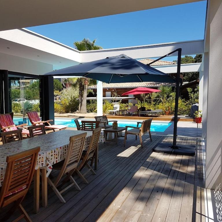 Villa CALIFORNIA Piscine chauffée 14x4m Moulleau Abatilles 10 pers - Villa avec Piscine Privée - 21