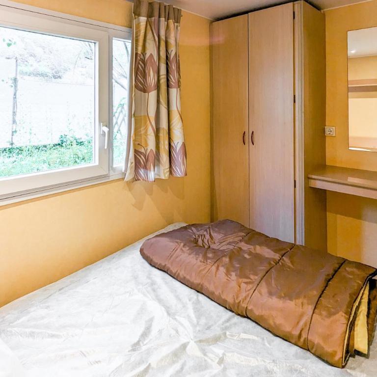 Camping 3* Les Templiers - Bungalow - 4