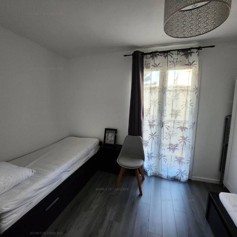 T3 rénové 49m², centre-ville Cavalaire-sur-Mer, plages à pied, clim, terrasse, parking sous-sol - FR-1-100-278 - Appartement - 9