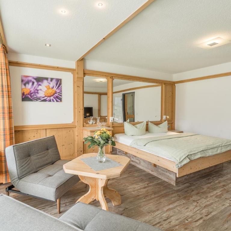 Wohlfühlhotel Frohsinn - Deluxe Doppelzimmer mit Balkon - 11