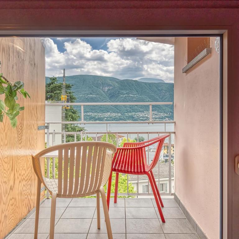 @ Home Hotel Locarno - Camera Tripla con Vista Lago - 7