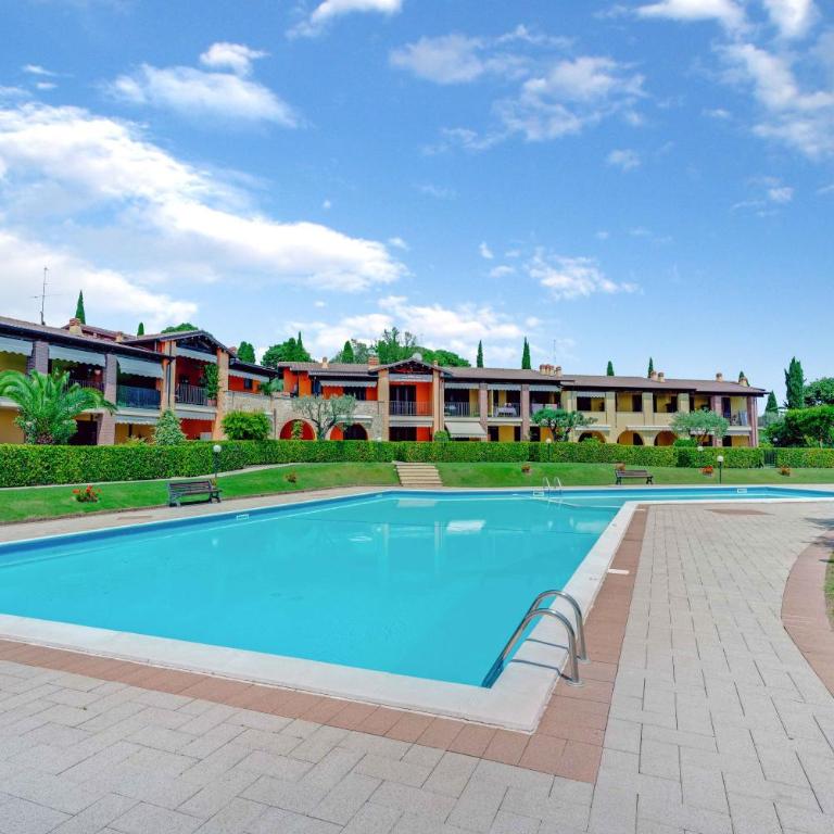 -Piscina e Parcheggio- Casa a pochi passi dal Lago - Apartment mit 1 Schlafzimmer - 1