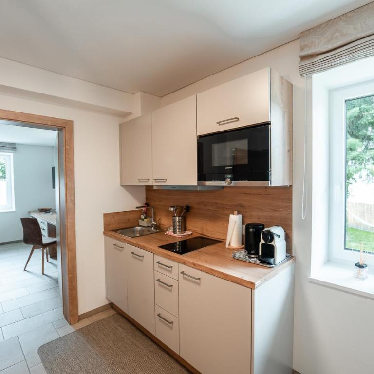 Haus Kulala - stilvolle Apartments zwischen Bergen & afrikanischem Flair - Apartment mit Terrasse - 15