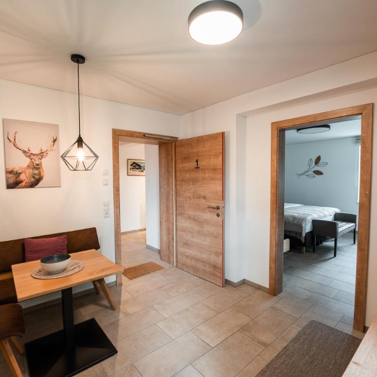 Haus Kulala - stilvolle Apartments zwischen Bergen & afrikanischem Flair - Apartment mit Terrasse - 12
