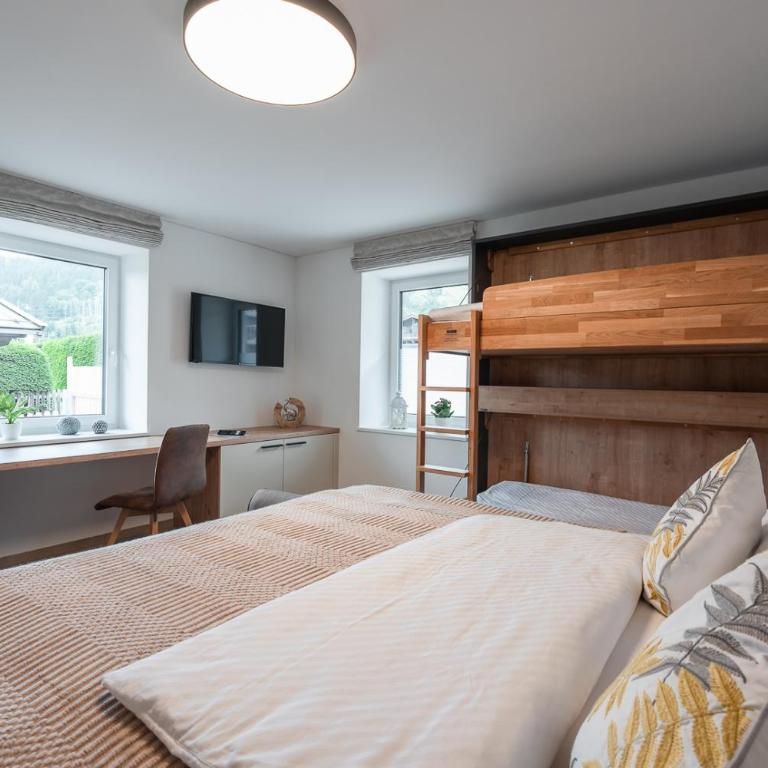 Haus Kulala - stilvolle Apartments zwischen Bergen & afrikanischem Flair - Apartment mit Terrasse - 11