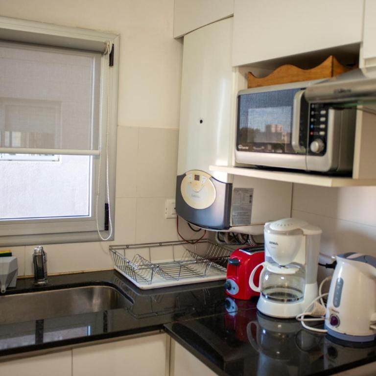 Departamento Premium con cochera y piscina - Apartamento de 1 dormitorio - 19