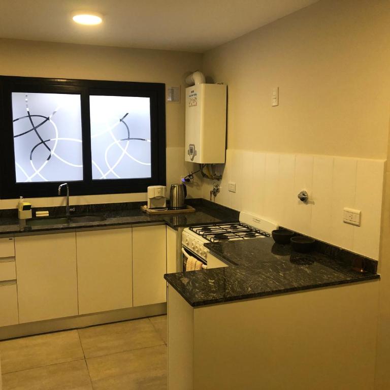 Departamento en primer piso a 900 metros de La Balcarce - Apartamento de 1 dormitorio - 29