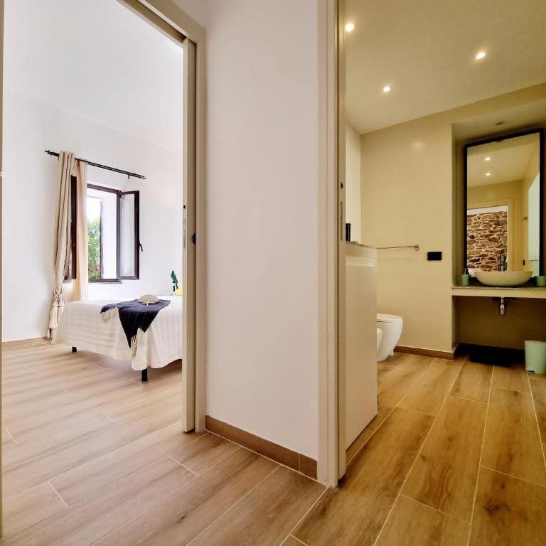 STAZZO SAN TEODORO IL GINEPRO Piscina Condivisa - One-Bedroom Apartment - 39