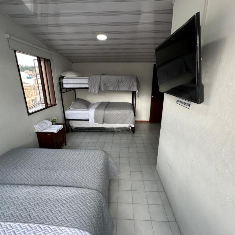 Hotel Rook INN - Habitación Cuádruple Confort - 4