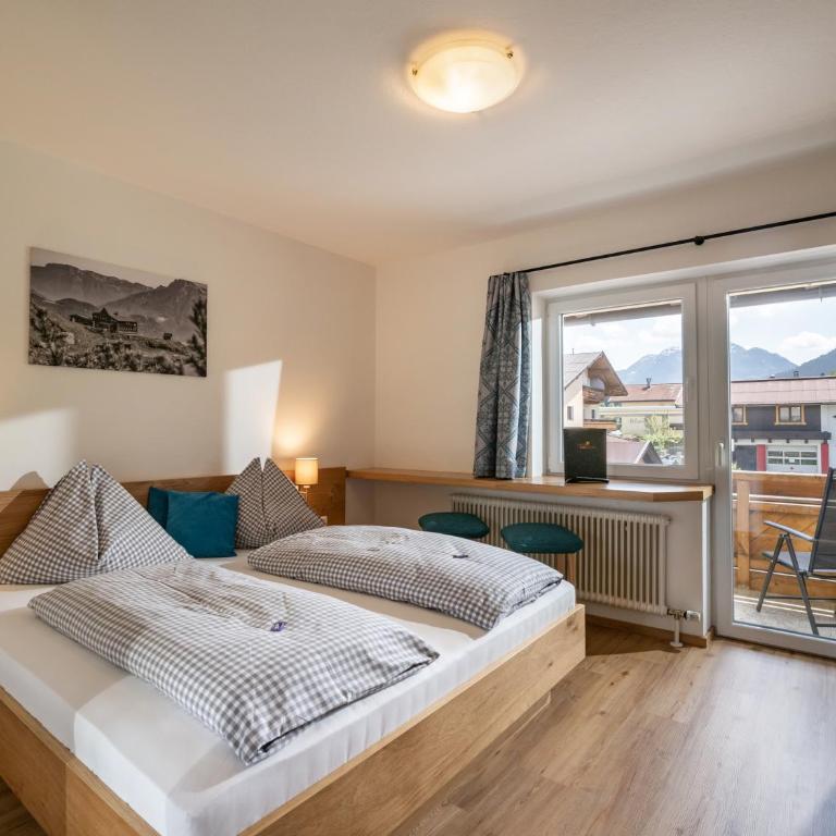 Pension Haus in der Sonne - Doppelzimmer mit Balkon - 1