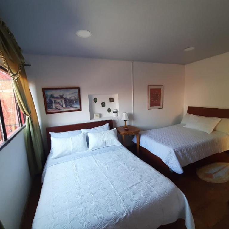 Hotel Posada Turística la Ceiba - Habitación Doble Estándar con vistas al jardín - 2 camas - 2
