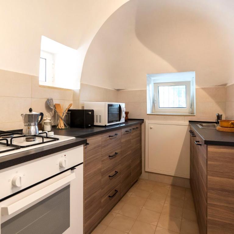 GuestHost - Trullo Grecla with pool and parking - Casa con 2 Camere da Letto - 13