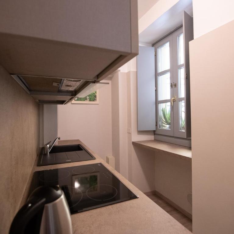 Alessi Appartamenti - Appartamento con 1 Camera da Letto con Balcone e Vista Città - 9