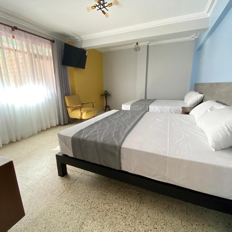 Izza Hotel - Habitación Doble con baño privado - 2 camas - 1