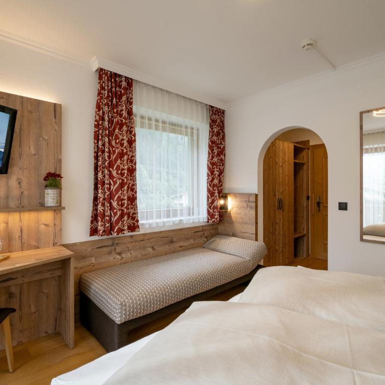 Hotel Garni Ferienhof - Deluxe Zimmer mit Schlafsofa - 5