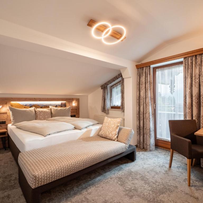 Hotel Garni Ferienhof - Deluxe Zimmer mit Schlafsofa - 7