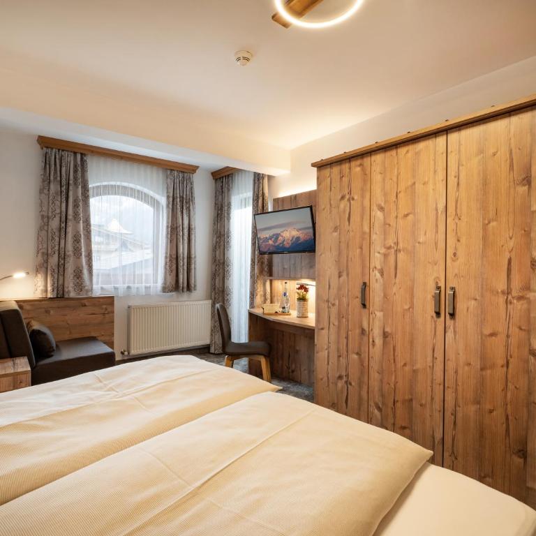 Hotel Garni Ferienhof - Deluxe Zimmer mit Schlafsofa - 14