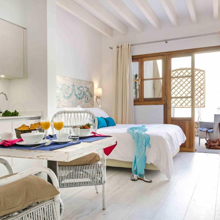 StayCatalina Boutique Hotel-Apartments - Estudio con patio jardín - 1