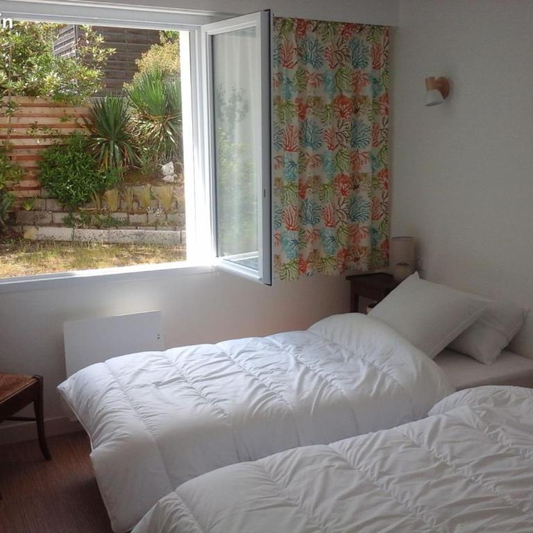 Appartement 3 chambres 6 pers rez de Jardin 5min plage quartier du Phare Location du dimanche au dimanche en juillet et aout - Apartamento de 3 dormitorios - 12