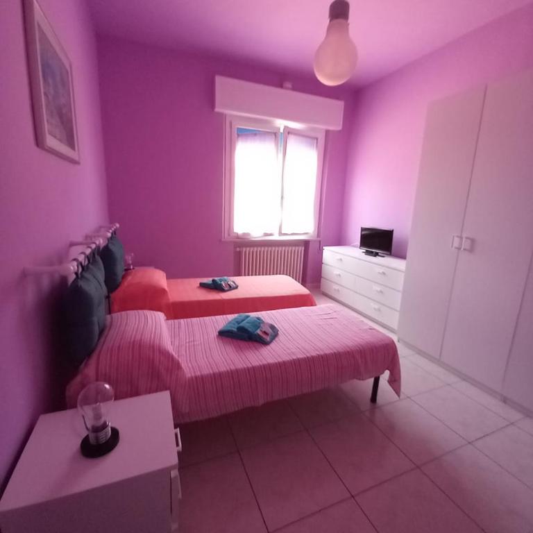 Affittacamere Appartamento colorato - Camera Queen con Bagno in Comune - 11