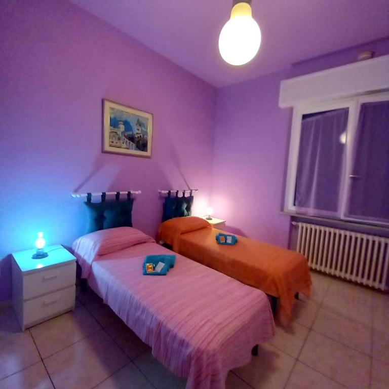 Affittacamere Appartamento colorato - Camera Queen con Bagno in Comune - 10
