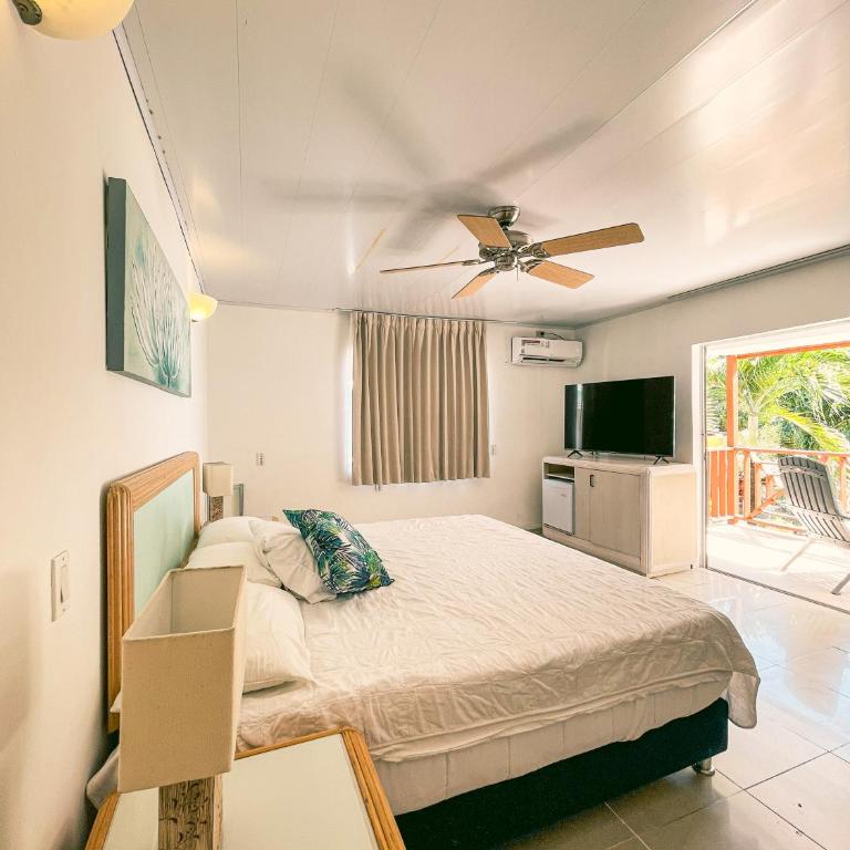 Hotel Cocoplum Beach - Habitación con cama extragrande y vistas al mar - 2