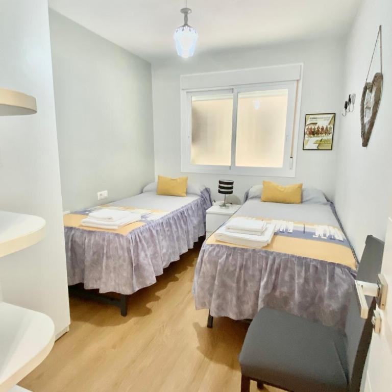 Apartamento con Parking Gratis en el Centro, 2 dormitorios - Apartamento de 2 dormitorios - 25