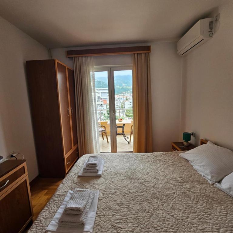 Apartments & Rooms Vuksanovic Ivana - Dvokrevetna Soba sa Bračnim Krevetom i Balkonom - 1