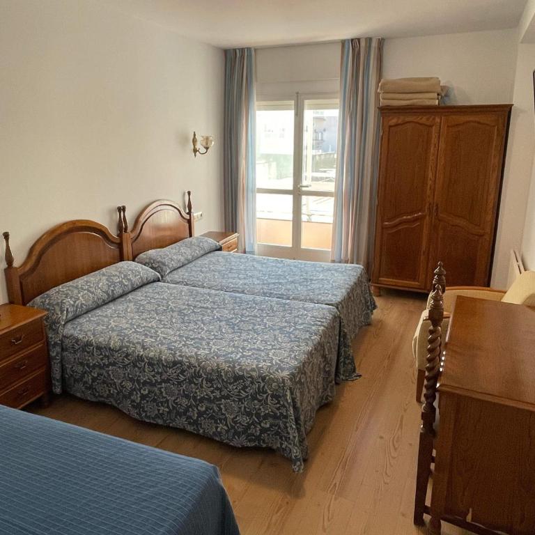 Hotel Amandi - Doppelzimmer mit Zustellbett - 6