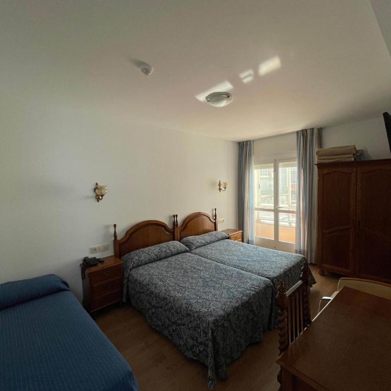 Hotel Amandi - Doppelzimmer mit Zustellbett - 5