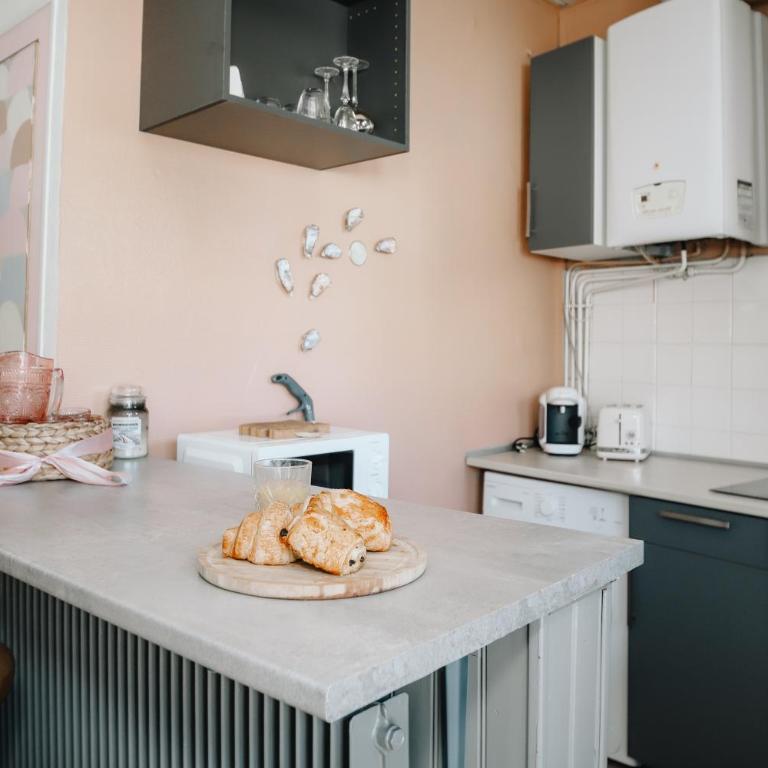 Coquillages et crustacés, vidéoprojecteur baignoire îlot chez Ivona Vacances - Appartement 1 Chambre - 14