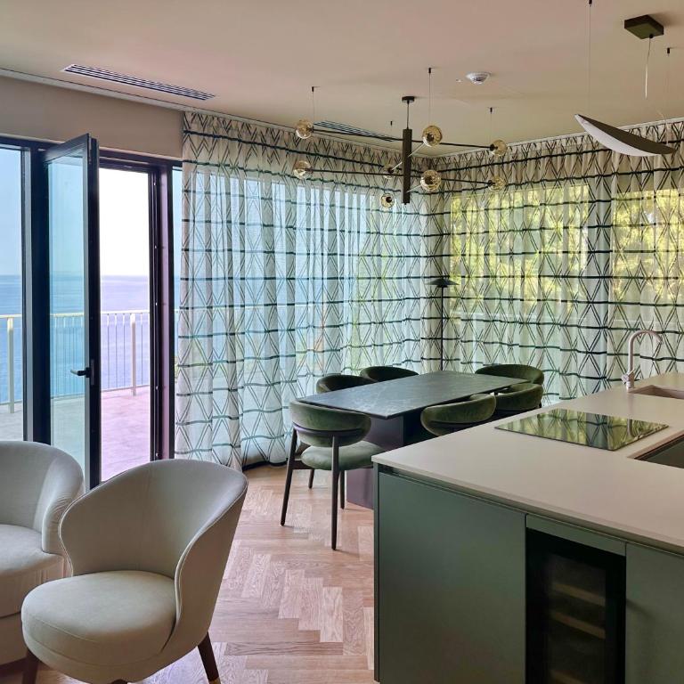 Maximilian Suites - Suite King con Terrazza e Vista Mare - 1