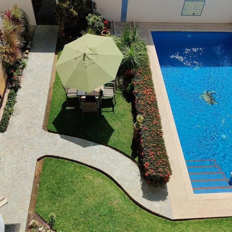 Apartment Tortugas - rooms with AC and great pool at 5 min from Carrizalillo beach and Benito Juarez Bulevard - Apartamento de 2 dormitorios - 1