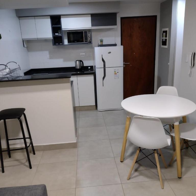 Leguizamon Studios & Suites Premium - Quadruple Room with Garden View - 11