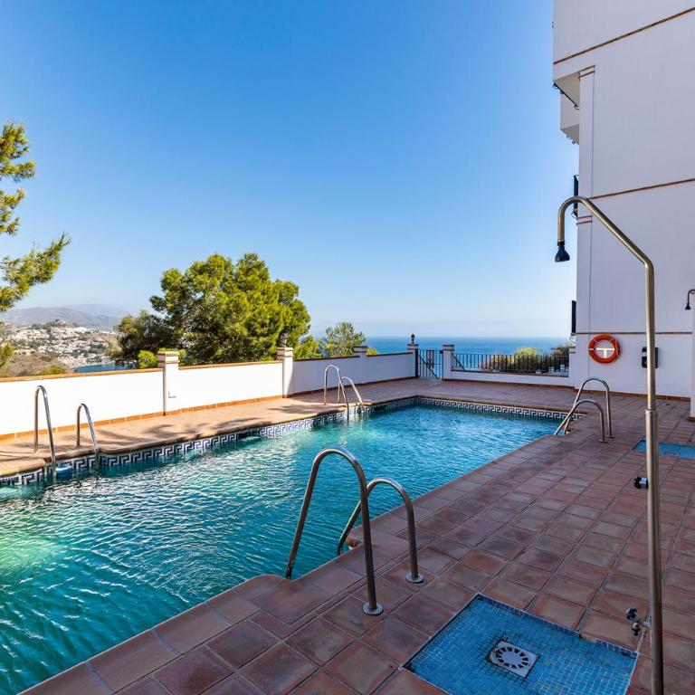 Apartamento con vistas y garaje en Marina del Este - Two-Bedroom Apartment - 44