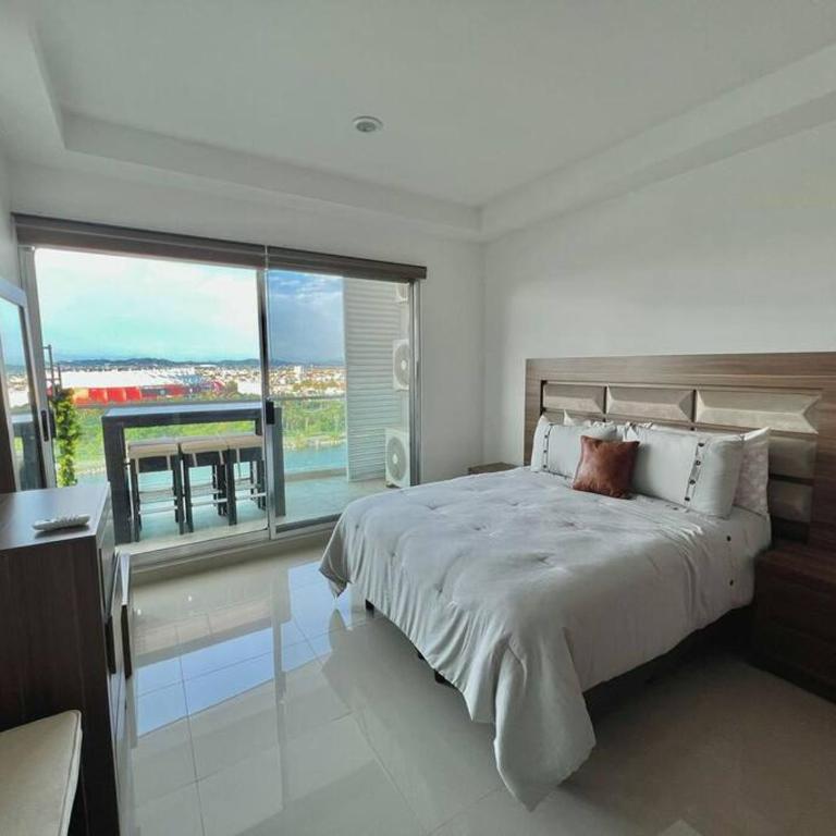 The One D12 Sobre el Malecón Vista al Estadio de Baseball - Two-Bedroom Apartment - 7