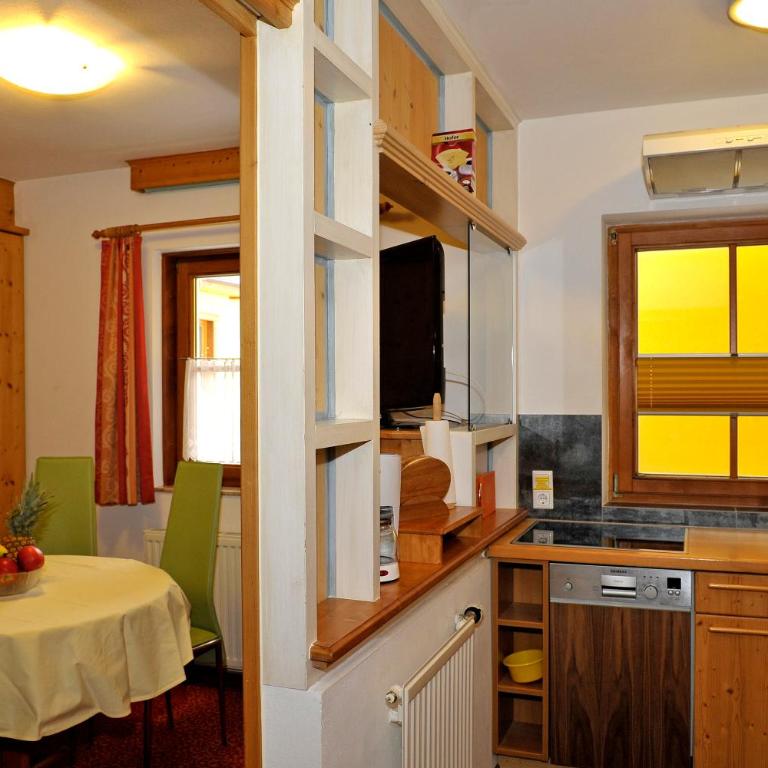 Apartmenthaus Sonnenhang - Familienzimmer mit Gartenblick - 1