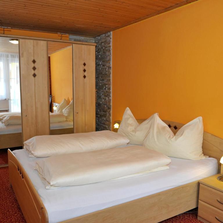 Apartmenthaus Sonnenhang - Familienzimmer mit Gartenblick - 5