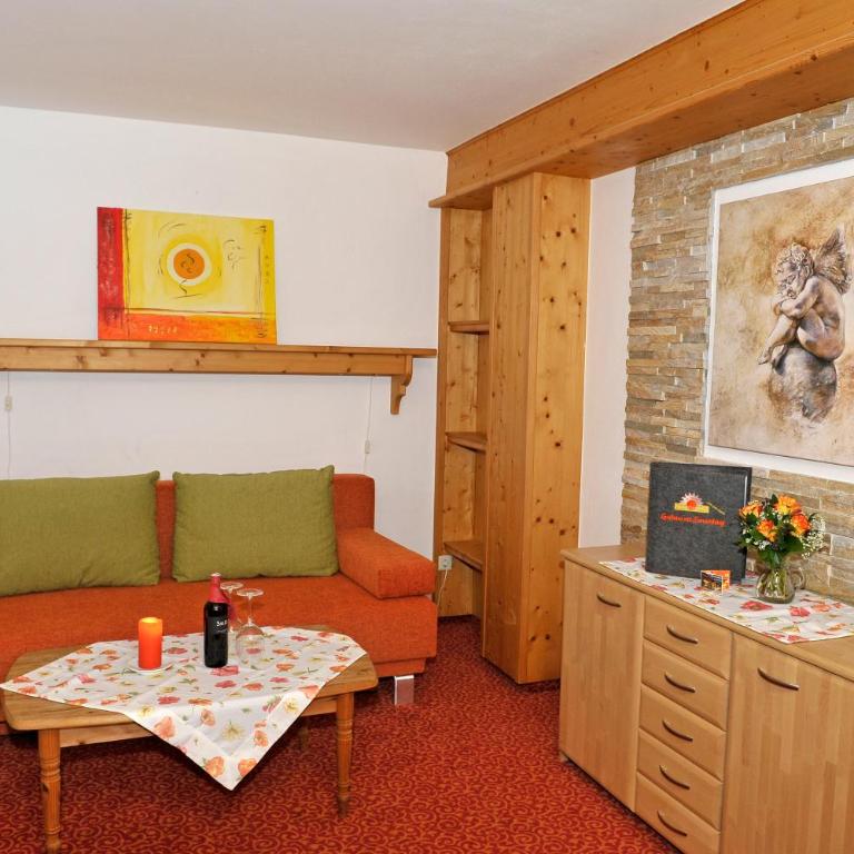 Apartmenthaus Sonnenhang - Familienzimmer mit Gartenblick - 10