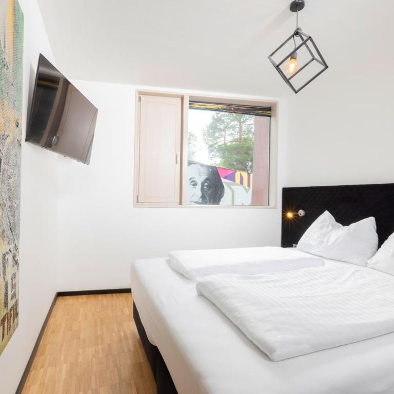 Das Edlinger - Doppelzimmer mit Blick auf den Innenhof - 7