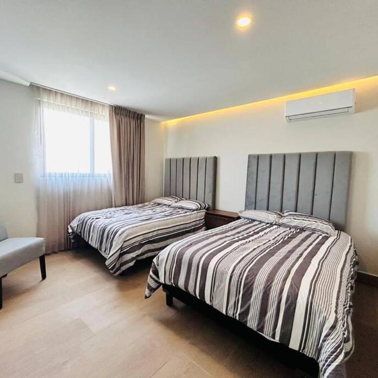 Elegante con vista al mar y malecón by G P S rentas - Two-Bedroom Apartment - 13