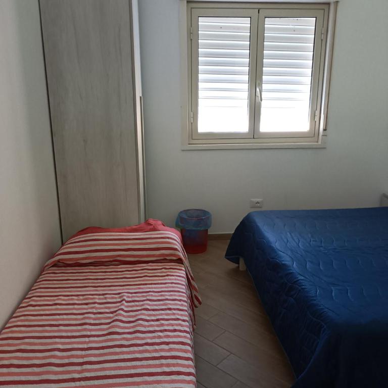 AL FARO - Camera Matrimoniale/Doppia con Letti Singoli con Bagno - 16